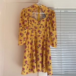 Asos John Zack cutout tie neck skater dress in yellow pink floral print.